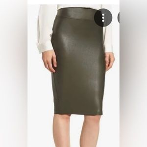 Brand new with tags knee length Spanx pencil skirt. Size XS. Olive green.